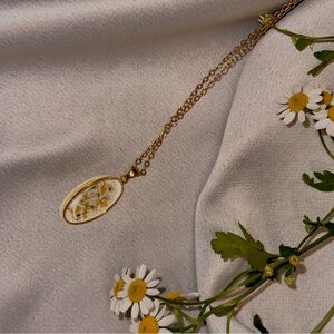 Gold necklace with flowers